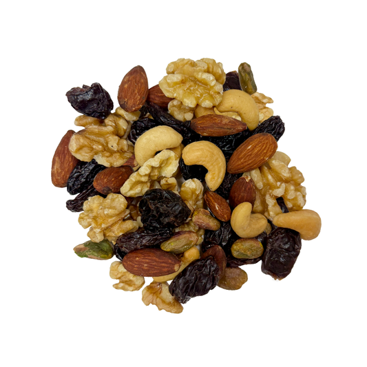 Assorted nuts and dried fruits on a white background